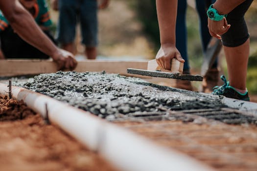 construction workers collaborating at a building site