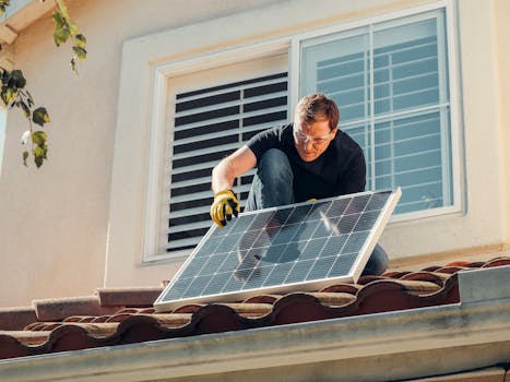 green building with solar panels