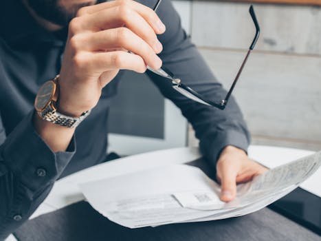 contractor reviewing paperwork