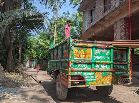 construction worker with a branded truck